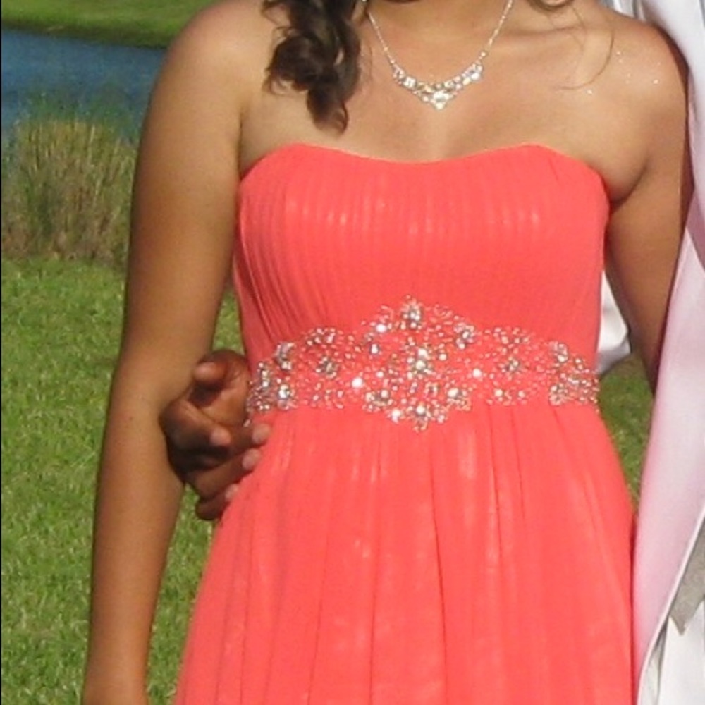 Strapless salmon colored formal/prom dress.